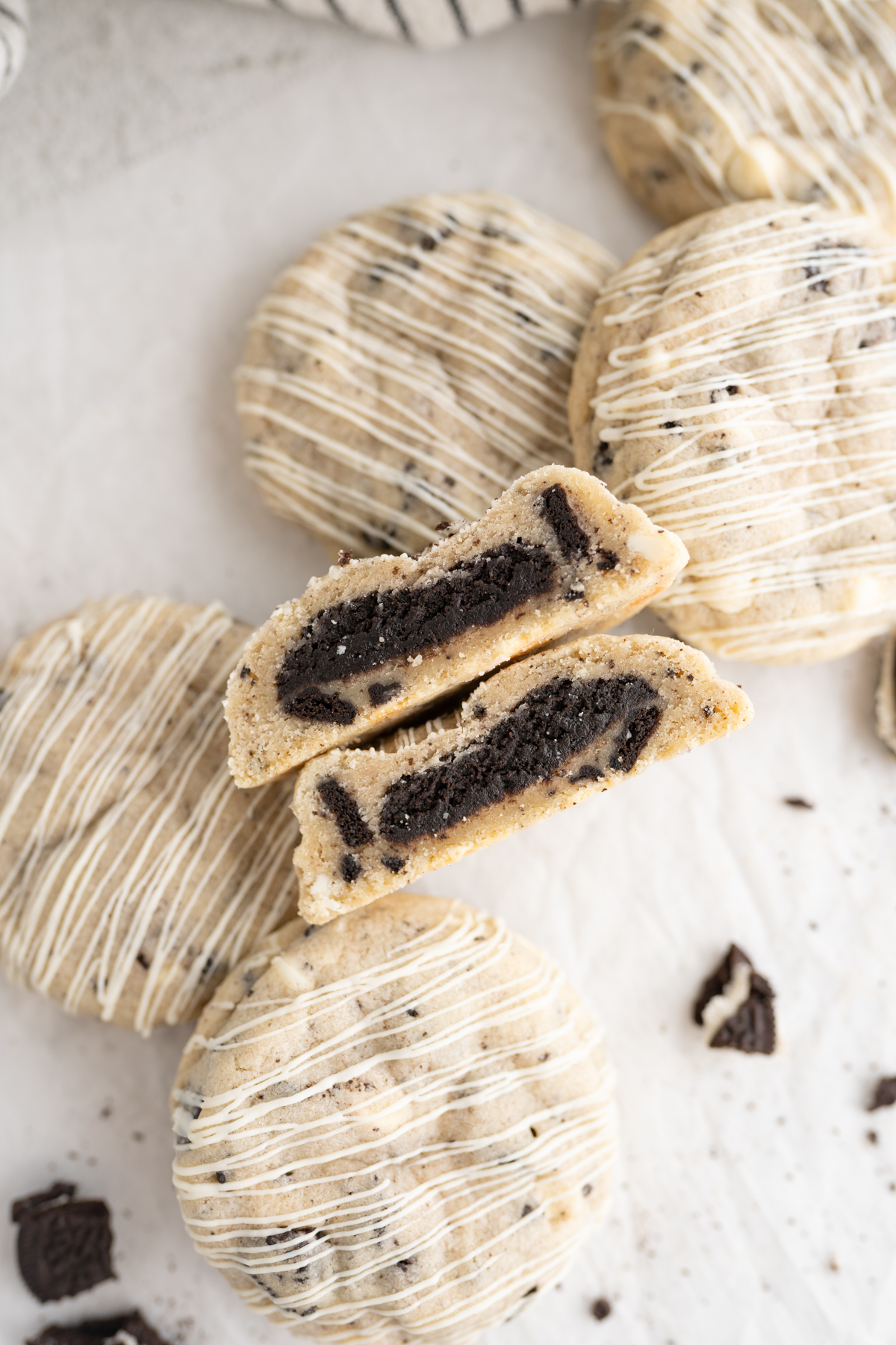 Aerial view of white chocolate oreo cookies filled with oreo truffles. 