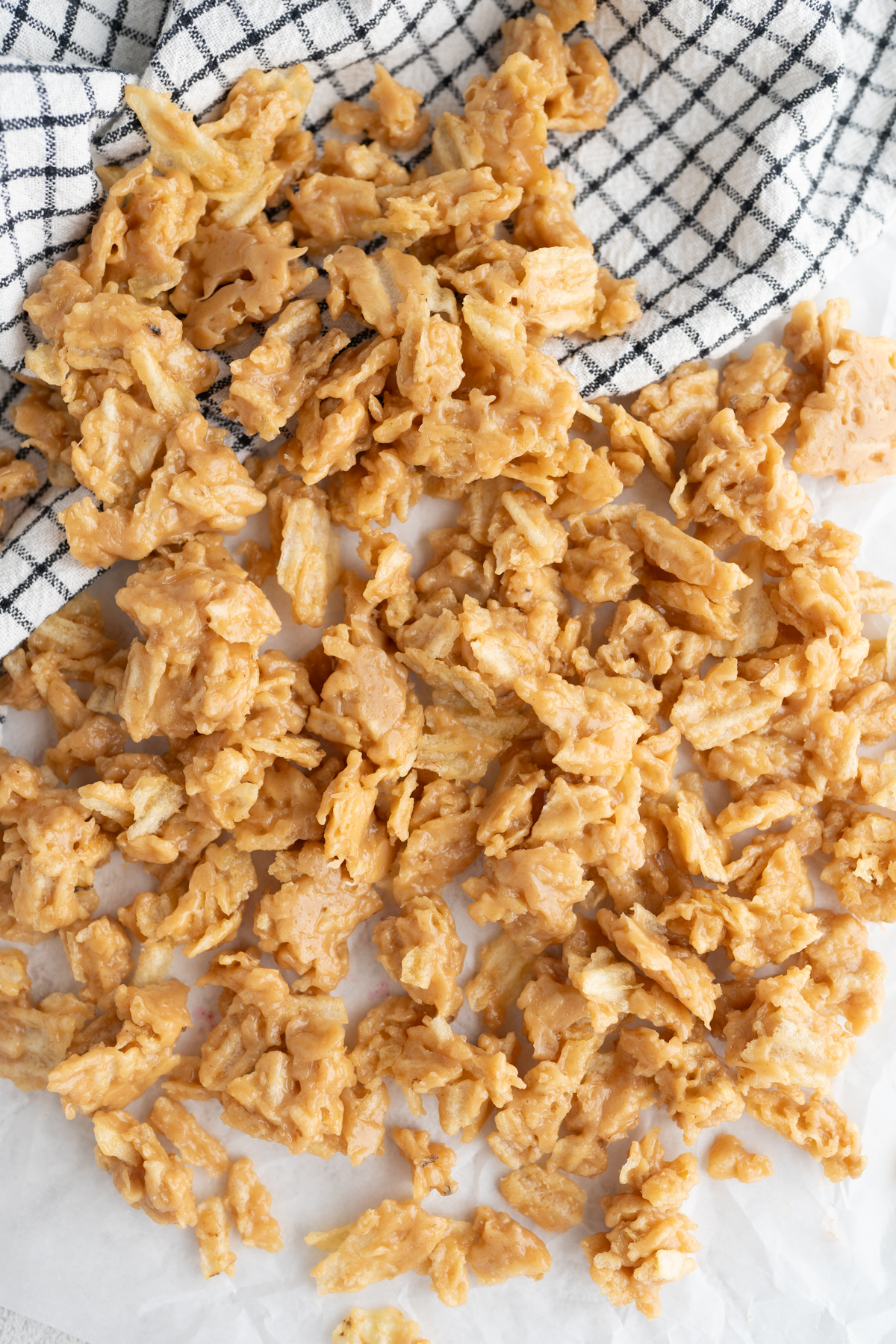 A counter filled with peanut butter potato chip candy. 